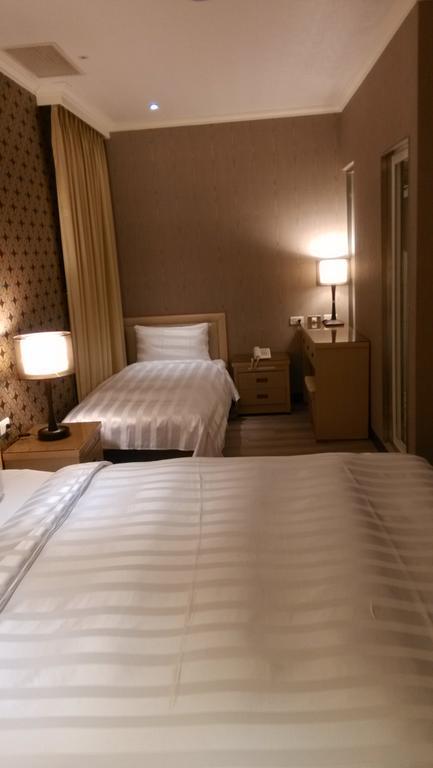 A Casa Hotel Taoyuan Zimmer foto